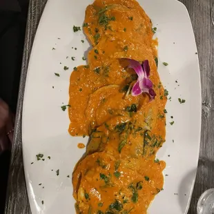 Spinach ravioli with vodka sauce