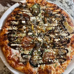 Vegetale Pizza
Mozzarella cheese, Sautéed vegetables, goat cheese and balsamic