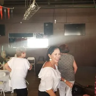 a group of people sitting at tables