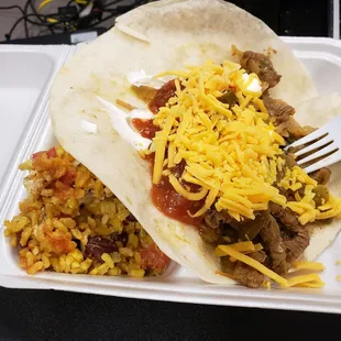 Fajitas and Spanish rice.