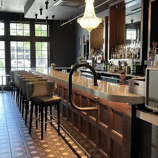 a bar with a lot of chairs