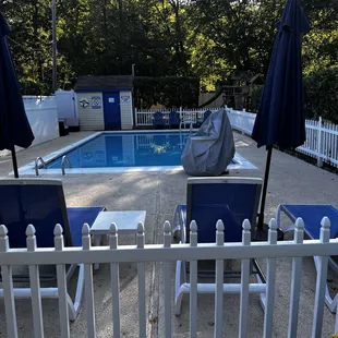 Tony patio around the pool with only a handful of lounge chairs.