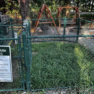 Unkempt, small dog park.