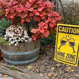 a caution wine zone sign