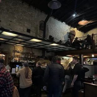 a crowd of people at the bar