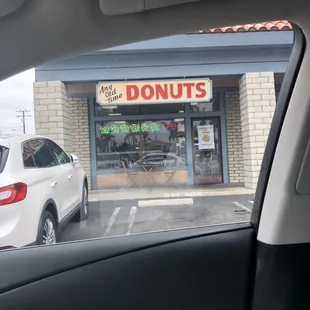the outside of a donut shop