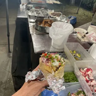 Burrito with asada and tripas (cut in half)