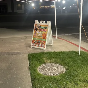 a sign in the grass