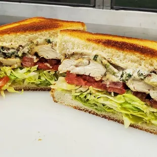 Spicy Grilled Chicken &apos;Wich  Spicy grilled chicken, grilled jalapeños, pepper jack cheese, lettuce, tomato, &amp; Cajun Sauce on Texas toast
