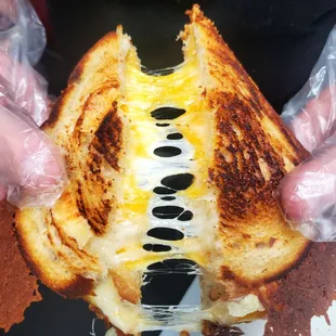 Super Grilled Cheese &apos;Wich  Swiss, Provolone, and Cheddar cheese with cheese crispins on toasted sourdough