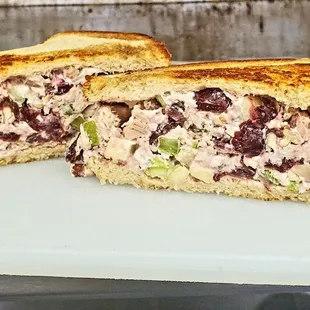 Chicken Salad &apos;Wich  Rotisserie chicken, dried cranberries, pecans, Granny Smith apples, celery, on toasted sourdough