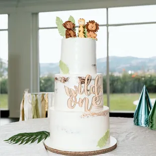 "Wild One" cake. How cute is that topper Anya made!