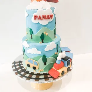 Planes ,trains and automobiles theme cake