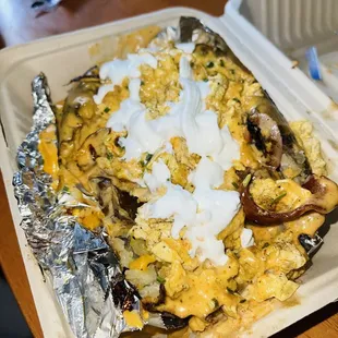 a meal in a styrofoam container