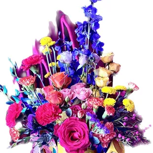 Spring time bright happy flowers in a watering can