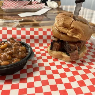 Brisket sandwich with a side of cowboy beans