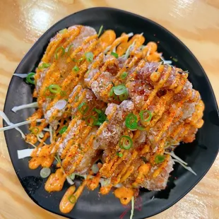 a plate of food on a wooden table