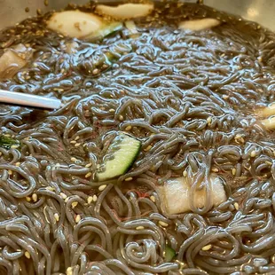 noodles and vegetables in a bowl