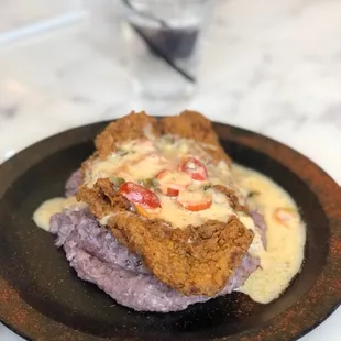 Fish and  Geechie Boy Grits with heirloom tomatoes &amp; pepper gravy