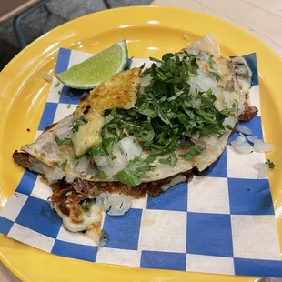 Gringa (flour tortilla, chihuahua cheese, cilantro, onions, pastor and pineapple)