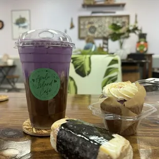 White chocolate macadamia nut ice latte with ube cold foam, taro cupcake with vanilla icing and toasted coconut; spam musubi with egg