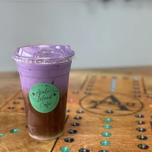 White chocolate macadamia nut iced latte with ube cold foam