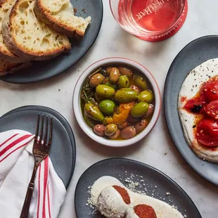 A collection of antipasto dishes plated