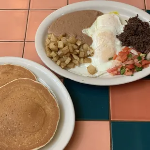Barboqua and egg plate with a short stack