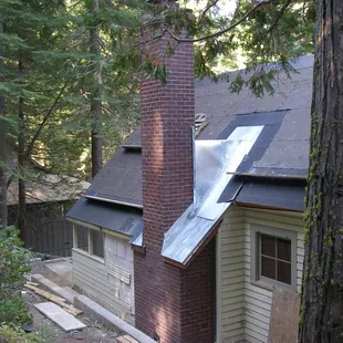 Common select 890 thin brick over real masonry fireplace