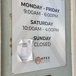 "Temporary" adjusted hours sign