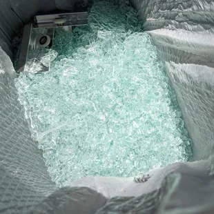 50lbs of shattered shower door.