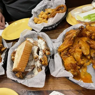 50 wings!!  Left to right lemon pepper, ranch, mild Appetizer trio with tots, onion rings &amp; cheese wedges