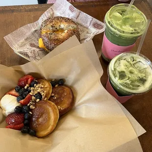 double berry pancakes, egg and cheese bagel, iced matcha drinks