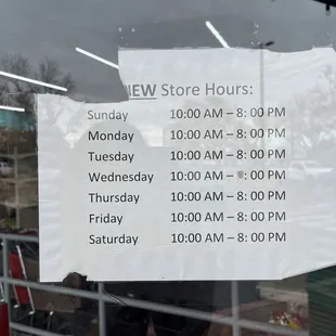 a sign in the window of a store