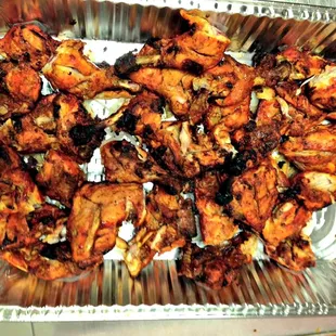 a tray of chicken wings