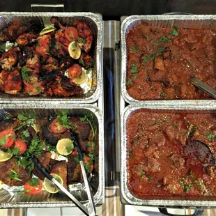 a variety of trays of food