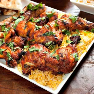 a plate of chicken and rice