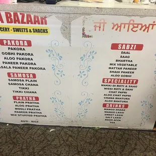 Menu on front counter. No prices.