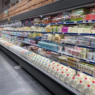 a dairy section in a grocery store