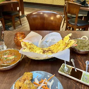 Garlic naan, chicken curry, lamb curry