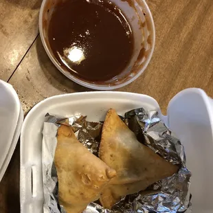 Samosas and dipping sauce.