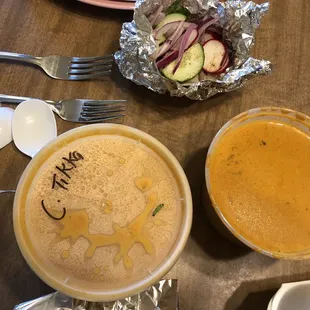 Chicken tikka masala and Shahi Paneer (curry tomato sauce and cheese).  Side of cucumbers, radish, and red onions.