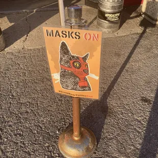 a sign with a cat on it
