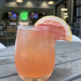 Poloma - Grapefruit margarita finished with a smoky mescal, garnished with grapefruit.