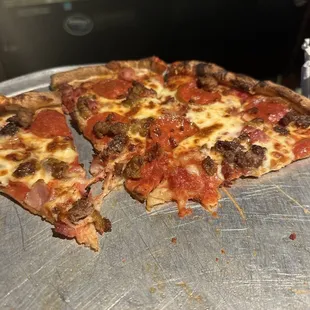 Meat lovers pizza will be taking home what's left