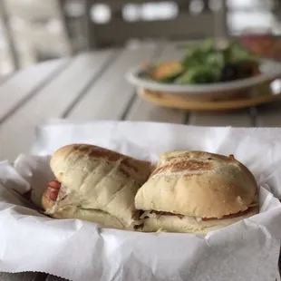two sandwiches in a basket on a table