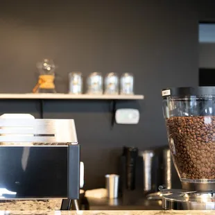 a blender and coffee beans
