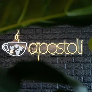 Apostoli logo neon sign.