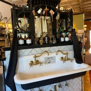 a sink with a mirror above it