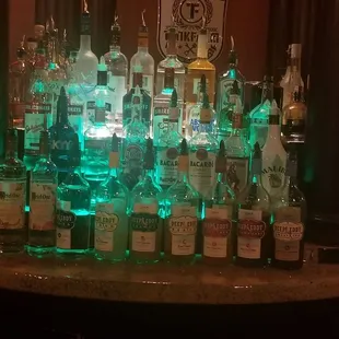 bottles of alcohol on a bar